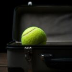 Pallina da tennis in valigia, perché